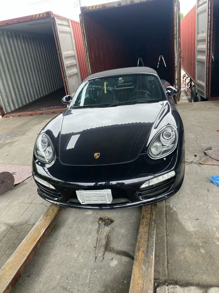 TokyoCarZ - Unwrapped Porsche from Japan through container shipping