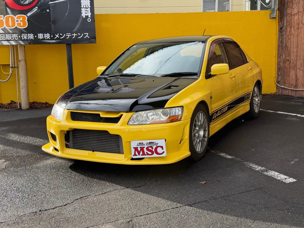 Import Mitsubishi Lancer Evolution 2.0 GSR VII 4WD Turbo 5-speed manual Aftermarket muffler Alloy wheels (Yellow) from Japan - For sale